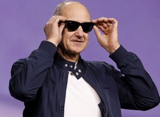 Roland Busch, President and CEO of Siemens AG, highlights Rayban Meta smart glasses integrated with AI during a news conference at the annual Consumer Electronics Show in Las Vegas, Jan. 6, 2026.