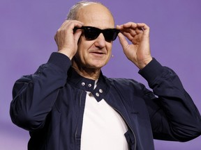 Roland Busch, President and CEO of Siemens AG, highlights Rayban Meta smart glasses integrated with AI during a news conference at the annual Consumer Electronics Show in Las Vegas, Jan. 6, 2026.