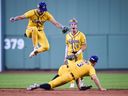 Jackson Olson #8 of the Savannah Bananas reacts to a play against The Firefighters at Fenway Park on July 05, 2025 in Boston, Massachusetts.