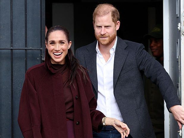 Britain's Prince Harry, Duke of Sussex and his wife Meghan, Duchess of Sussex, react after they visit to the Community Recording Studio (CRS) in Nottingham, central England on October 15, 2026.