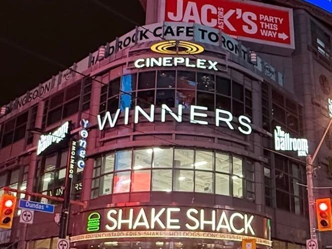 Exterior of Yonge and Dundas Square stores and businesses.