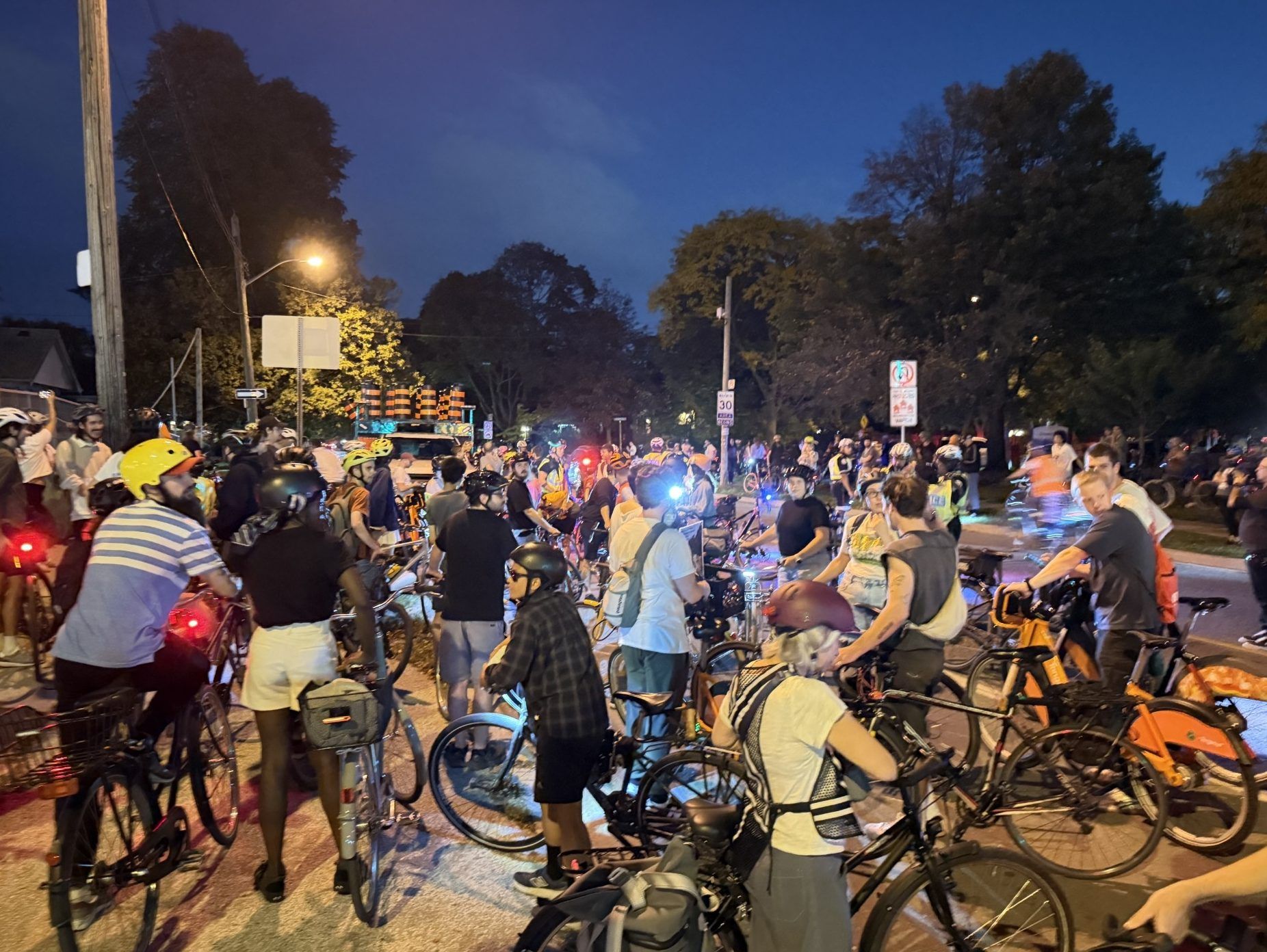 Cyclists gather in the area of Bloor St. W. and Islington Ave.