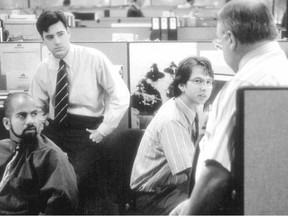 (L-R): Ajay Naidu, Ron Livingston, David Herman and Richard Riehle star in a scene from 'Office Space'.