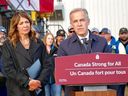 Alberta Premier Danielle Smith looks on while Prime Minister Mark Carney speaks during an announcement that the Pacific Link has been listed as a project of national interest, in Fort McMurray, Alta. on Thursday, Oct. 1, 2026