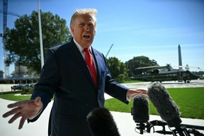 U.S. President Donald Trump may retreat into his White House building projects, like the new South Lawn helipad. (Jim WATSON/AFP)