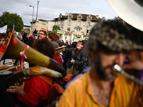 Protesters dance during a demonstration over learning conditions in Paris on Oct. 22, 2026, as France braced for more demonstrations just days after student and other rallies degenerated into some of the worst street unrest in years.