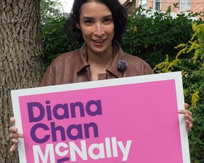 Diana Chan McNally with sign