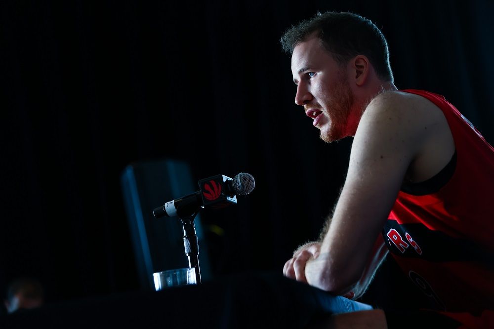 Jakob Poeltl of the Toronto Raptors speaks to media during the Toronto Raptors media day at Hotel X on September 28 in Toronto.