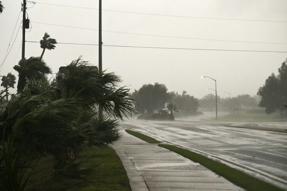 Isaias drenches southern U.S. as weakened post-tropical cyclone