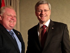 Prime Minister Stephen Harper met with Toronto Mayor Rob Ford in Mississauga last December. (Toronto Sun file photo)
