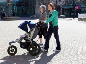 People walk through the Forks in Winnipeg Monday May 16, 2011. Enjoy the sun while it lasts! (BRIAN DONOGH/Winnipeg Sun)