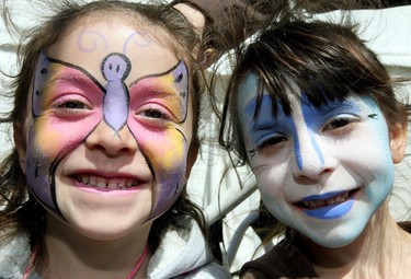 (Left to right) Sisters Haylee Galloway, 4, and Kalyn Galloway, 6, poses for a photo after having their faces painted during the Rainmaker Rodeo in St. Albert, Saturday May 28, 2011. (DAVID BLOOM/EDMONTON SUN)