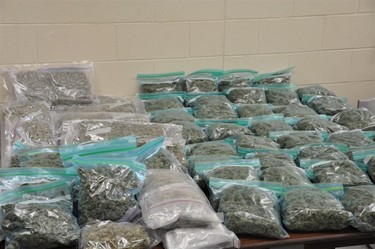 Officers raided the William Avenue eatery early Wednesday and seized about 30 pounds of packaged marijuana and approximately $30,000 cash, RCMP said. (HANDOUT)