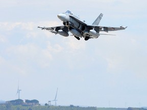 A CF-18 Hornet from 425 Tactical Fighter Squadron in Bagotville takes off from Trapani, Italy, in March. (File photo)