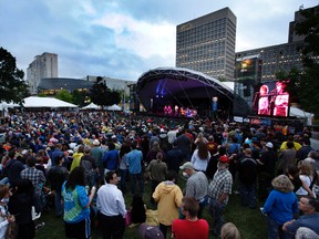 More than 11,000 Jazz Festival fans gather at Confederation Park on Thursday for an opening night lineup that featured Robert Plant. (Tony Caldwell, Ottawa Sun)