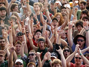 Fans cheer for The Flaming Lips as they headline the opening day of the 2011 Cisco Ottawa Bluesfest on Tuesday.(DARREN BROWN/OTTAWA SUN)