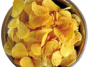 Potato chips are a staple for summer activities like camping, road trips and rainy movie nights. Each daily serving containing one ounce (or about 15 chips) has approximately 160 calories. (QMI Agency files)