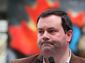 Canadian Immigration Minister Jason Kenney speaks in Calgary, Alta., July 12, 2011. (QMI Agency/ Jim Wells)