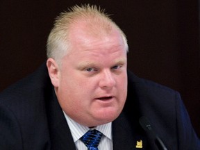 Rob Ford says taxpayers wants three essential services:  cops, “clean, smooth roads” and garbage pickup. (Toronto Sun file photo)