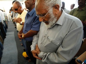 Nearly 200 men participate in afternoon prayers at the Islam Care Centre in Ottawa. (DARREN BROWN/QMI AGENCY)