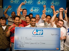 Seventeen of 18 winners of $7.1 million showed up at the OLG office in Toronto Friday to pick up their winnings. (Dave Thomas/QMI Agency)