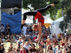 Kimberly Craig performs acrobatics as a part of the "street circus" during the final day of the Edmonton Fringe Festival in Edmonton, AB on August 21, 2011. (LAURA PEDERSEN/EDMONTON SUN)