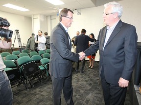 Premier Greg Selinger (right) and Mark Chipman at MTS Centre in Winnipeg on Friday, Sept. 16, 2011. (Chris Procaylo, Winnipeg Sun)