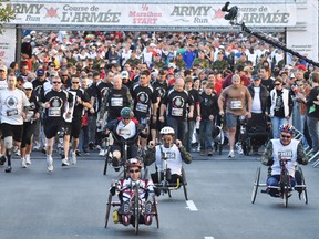 Runners prepare to take off from the starting line at the 2011 Army Run in Ottawa, Sunday, Sept. 18, 2011. (File photo)
