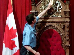 A worker cleans the Senate chamber in this 2002 photo. The best plan to clean up the Senate might be to get rid of it entirely. (QMI AGENCY FILES)