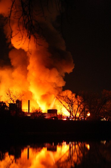 A fire broke out at Gateway Industries in Winnipeg's Point Douglas Wednesday, Oct. 19, 2011. Some area residents  say there were several explosions before the blaze engulfed much  of the facility. (SEBASTIEN PERTH/Winnipeg Sun)