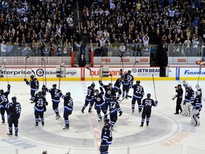 The Winnipeg Jets salute their fans after getting their first ever team victory over the Pittsburgh Penguins during their NHL hockey game in Winnipeg October 17, 2011. Winnipeg sports fans will enjoy the Jets and Blue Bombers playing in the city on the same day on Saturday.