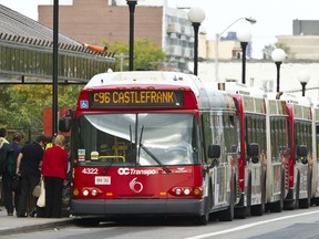 OC Transpo buses lined up on the MacKenzie Bridge. Wednesday, Sept. 21,2011. (ERROL MCGIHON/OTTAWA SUN)