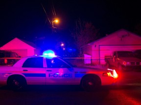 Edmonton police at a crime scene. (CODIE MCLACHLAN/EDMONTON SUN FILE)