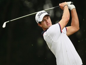Adam Scott tees off on the 17th hole during the third round of the WGC-HSBC Champions golf tournament in Shanghai November 5, 2011. (REUTERS/Aly Song)