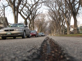 A road in need of repair in River Heights.