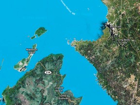 Two men were boating from Bloodvein to Matheson Island around 2:30 p.m. Nov. 14, 2011 when the boat hit a reef and flipped. (Google Maps)