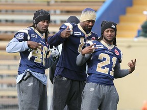 Defensive backs Alex Suber (right) and Brandon Stewart (centre, with linebacker Merrill Johnson) were Swaggerville, back in 2011. (JASON HALSTEAD/Winnipeg Sun Files)