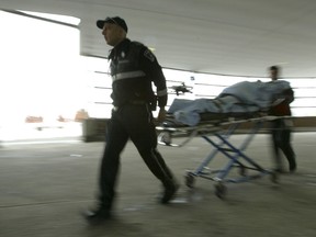 Paramedics transport a patient to the Ottawa Hospital's Civic campus. (Ottawa Sun file photo)
