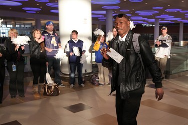 Winnipeg Blue Bombers SB Clarence Denmark heads for the team's flight as the Bombers prepared to leave Winnipeg Richardson International Airport to play in the CFL Grey Cup in Vancouver. (JASON HALSTEAD, Winnipeg Sun)
