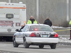 An 84-year-old man was rushed to hospital in critical condition after he was hit by a Winnipeg Transit bus on Tuesday, Dec. 20, 2011. (Chris Procaylo, Winnipeg Sun)