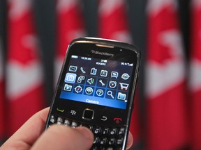 Blackberry in use. (QMI Agency File Photo)