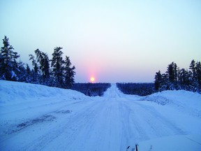 A file photo shows a winter road. John Weiss, 37, was driving near Bloodvein First Nation, 10 km east of the Loon Strait junction, when his vehicle hit a patch of ice, leading to a fatal crash.