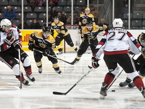 Frontenac centre Cody Alcock moves the puck down the ice during the game against the Ottawa 67s Sunday afternoon, Jan. 1, 2012 at the K-Rock centre. The Frontenacs won the game 5-2. (Melissa Murray/QMI Agency)