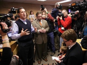 Republican presidential candidate Rick Santorum campaigns at The Daily Grind in Sioux City, Iowa, Jan. 1, 2012. (REUTERS/John Gress)