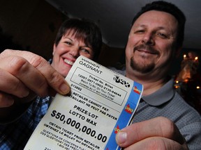 Jo-Ann and Gaetan Champagne pose for a photo in their Hawkesbury, Ont. home January 2, 2011.  The couple  won $50 million in the Dec. 30, 2011 Lotto Max draw. 
(TONY CALDWELL/OTTAWA SUN)