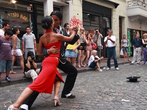 Dancers perform the tango on the streets of Buenos Aires, Argentina. (Shutterstock)