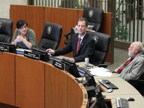 The three city councillors on the city centre community committee — Jenny Gerbasi (from left), John Orlikow and Harvey Smith - voted on Tuesday, Jan. 3, 2012, unanimously in favour of the city kicking in $200 for an event that saw dozens of people sing Christmas carols for inmates outside the Winnipeg Remand Centre on Dec. 22. (Jason Halstead, Winnipeg Sun)