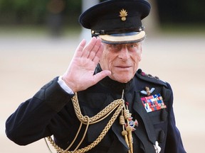 Britain's Prince Philip arrives on the eve of his 90th birthday to take the salute of the Household Division Beating Retreat on Horse Guards Parade in London, June 9, 2011. (REUTERS/Paul Edwards)