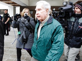 Ex-bishop Raymond Lahey is released on time served after being sentenced to 15 months in jail and two years probation, for importing child porn that included bondage photos of young boys wearing religious trappings, at the Ottawa Courthouse Wednesday, Jan. 4, 2011. 
(DARREN BROWN/OTTAWA SUN)