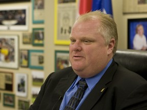 Well pleased: Mayor Rob Ford - who questioned staff on those suggested cuts - heralded the bid to save those programs.